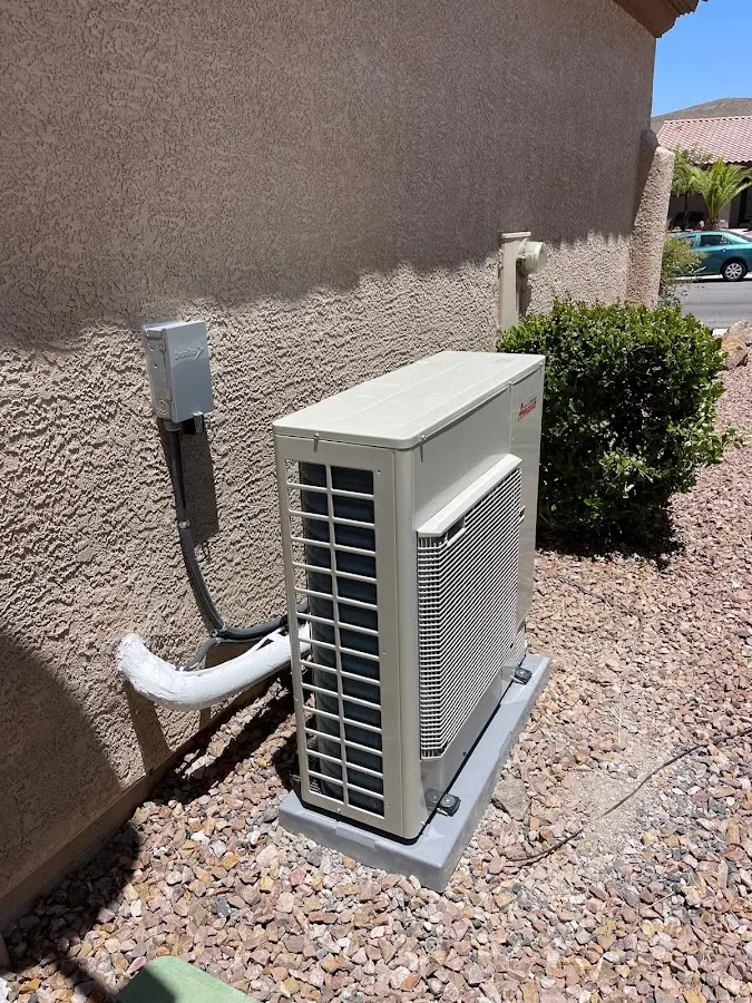 Residential air conditioning condenser unit in Bedminster